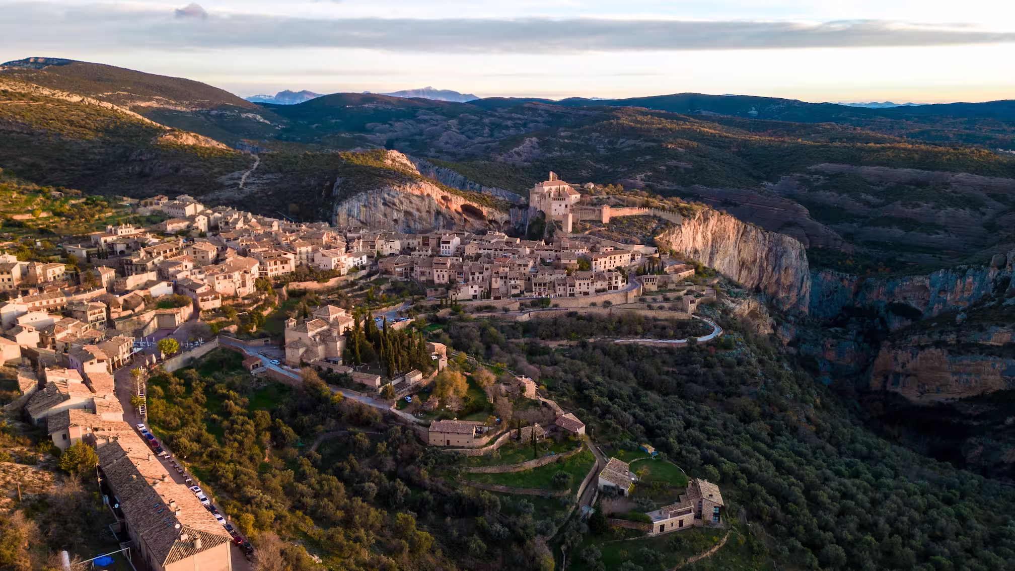 Spain Stunning aerial view of Alquézar village nestled in the Aragón hills at sunset